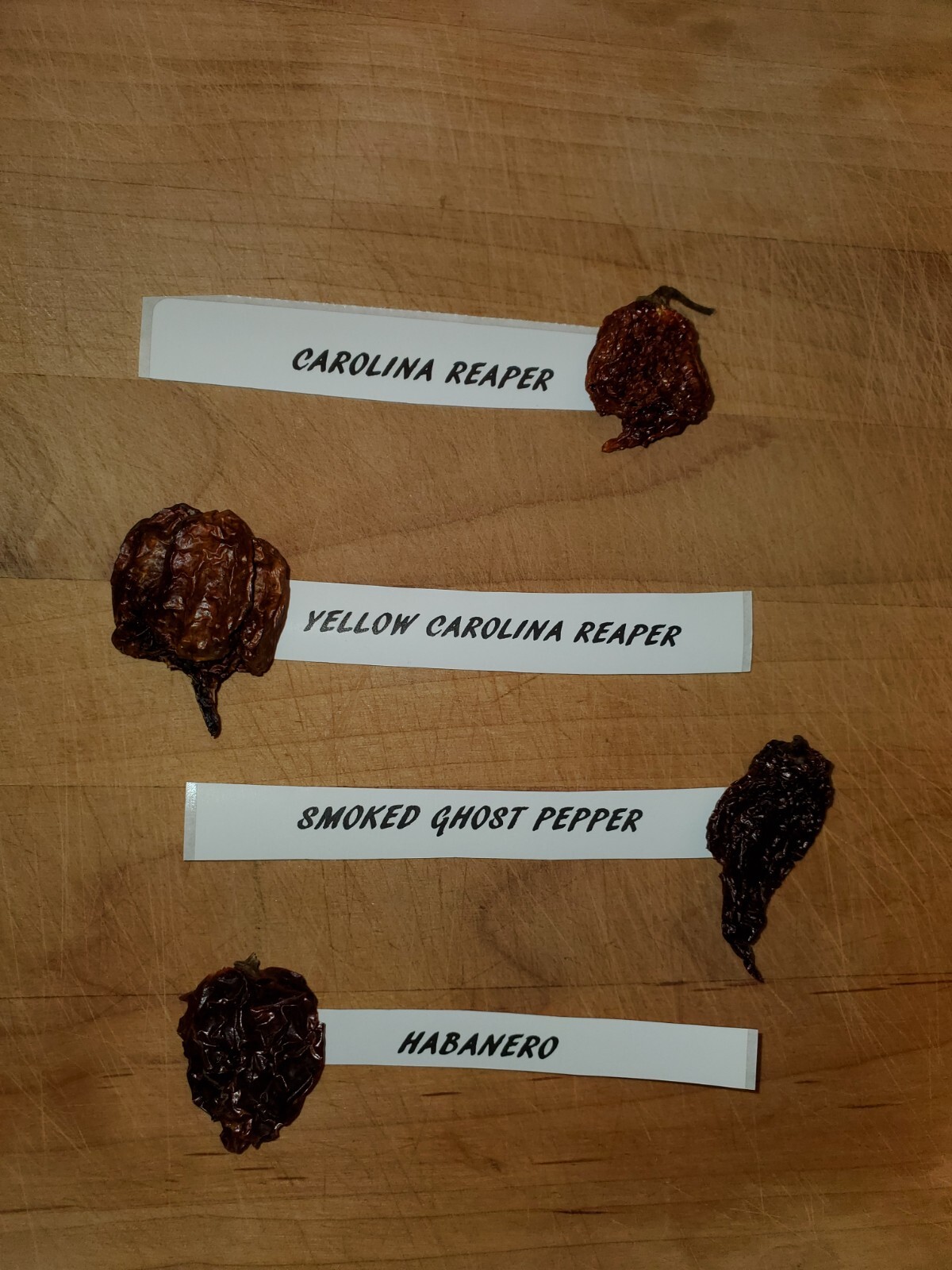 Organic Carolina Reaper, Yellow Reaper, Ghost pepper and habanero. Fiery hot!